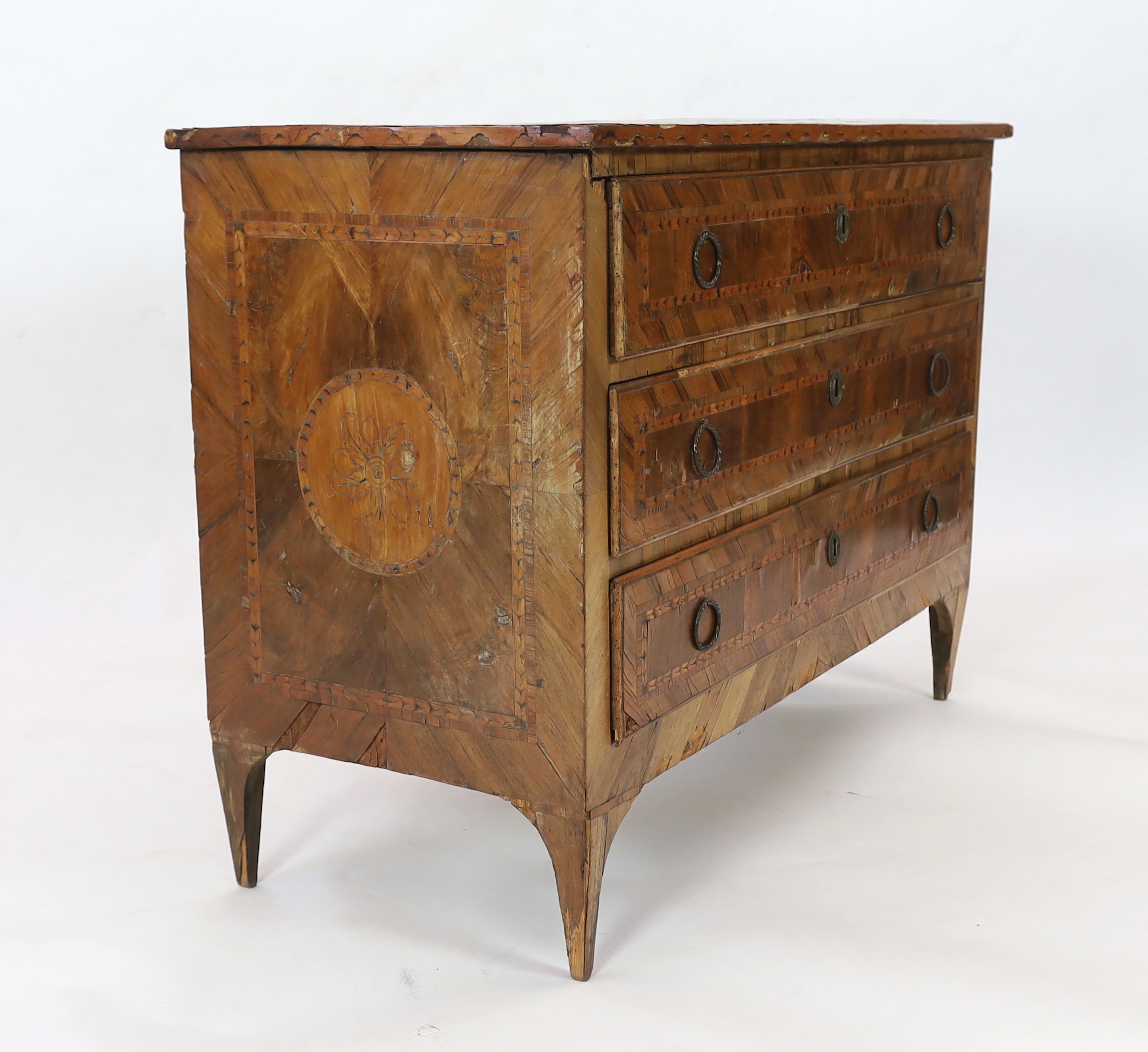 A late 18th century Italian olive wood and parquetry commode